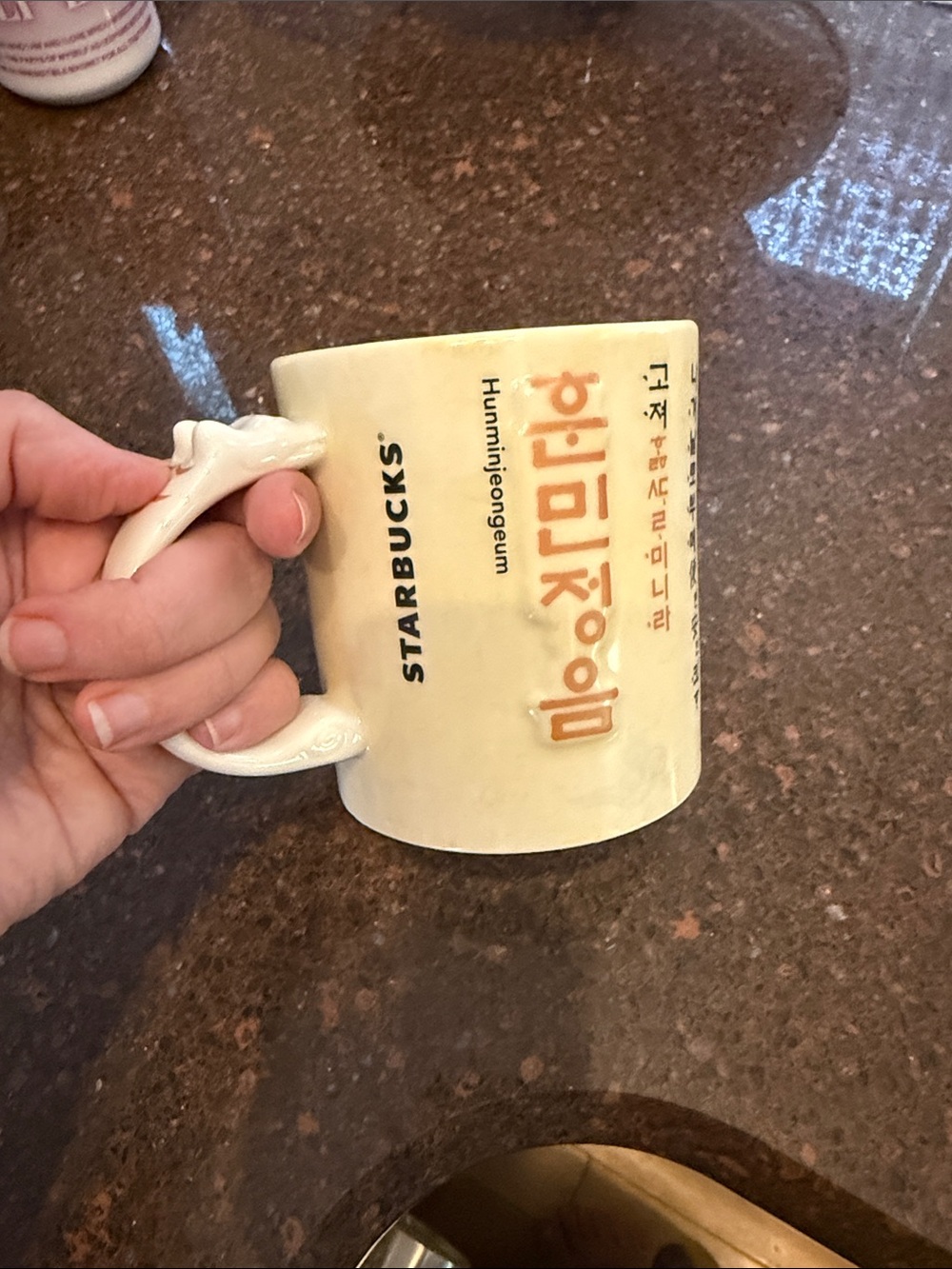 Starbucks Ivory Mug with Orange Korean Script and Dolphin Handle
